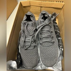 Never worn NOBULL dark knit runner.